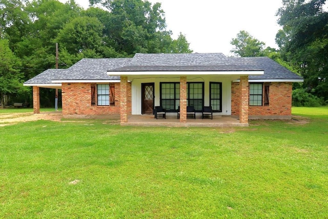 42073 Farlow Ln, Ponchatoula, LA 70454 - ranch-style home featuring a front lawn, brick siding, and a shingled roof