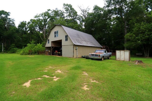 42073 Farlow Ln, Ponchatoula, LA 70454 - view of pole building featuring a lawn