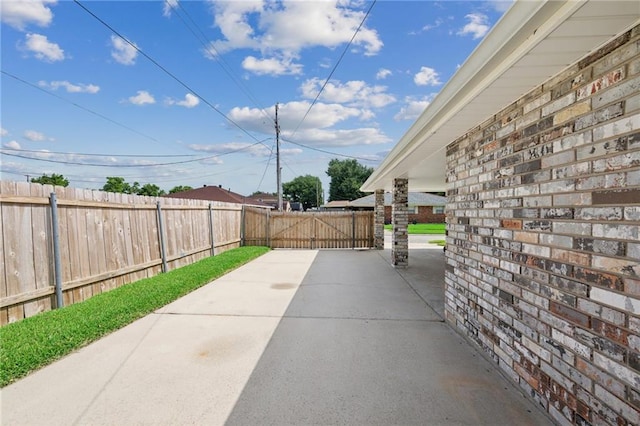 2228 Veronica Dr, Chalmette, LA 70043 - view of patio with fence and a gate
