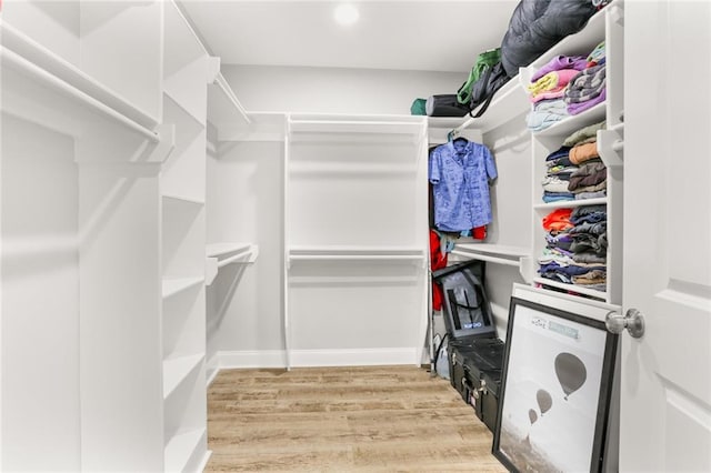 2067 Lafreniere St, New Orleans, LA 70122 - walk in closet with wood finished floors