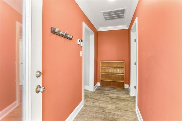 2067 Lafreniere St, New Orleans, LA 70122 - corridor with wood finished floors, baseboards, and crown molding