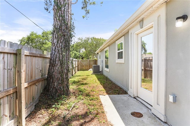 2067 Lafreniere St, New Orleans, LA 70122 - view of yard featuring central AC and a patio