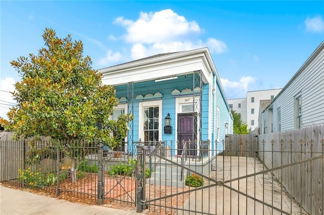 1607 N Villere St, New Orleans, LA 70116 - view of front of property featuring a gate and a fenced front yard