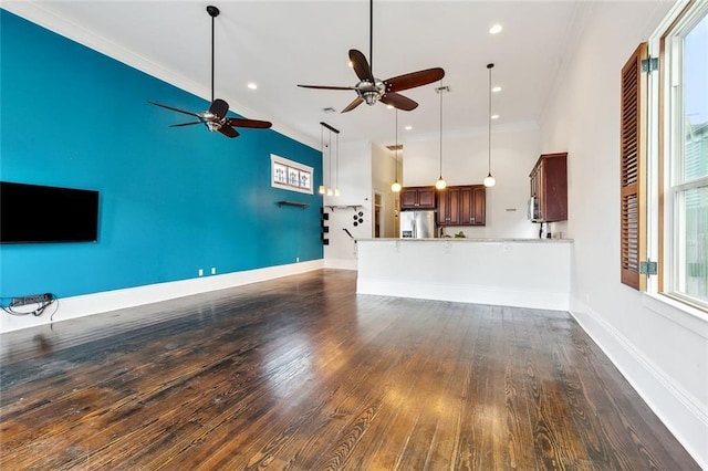 1607 N Villere St, New Orleans, LA 70116 - unfurnished living room with ceiling fan, dark wood finished floors, crown molding, baseboards, and recessed lighting