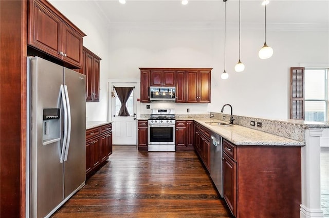 1607 N Villere St, New Orleans, LA 70116 - kitchen featuring stainless steel appliances, a sink, a peninsula, healthy amount of natural light, and crown molding
