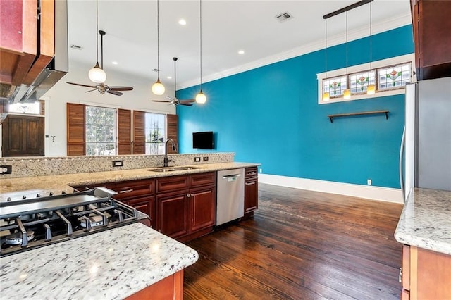 1607 N Villere St, New Orleans, LA 70116 - kitchen with stainless steel dishwasher, a sink, freestanding refrigerator, a ceiling fan, and dark wood-style flooring