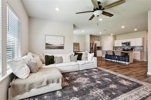 784 Bent Cypress Ln, Slidell, LA 70461 - living area featuring dark wood-style flooring, a ceiling fan, and recessed lighting