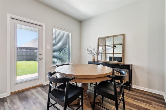 784 Bent Cypress Ln, Slidell, LA 70461 - dining space with healthy amount of natural light, wood finished floors, and baseboards