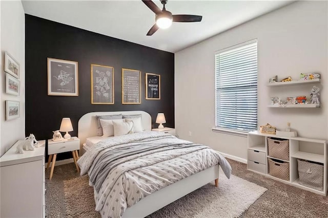 784 Bent Cypress Ln, Slidell, LA 70461 - bedroom with carpet flooring, multiple windows, baseboards, and ceiling fan
