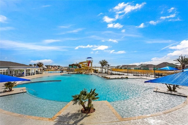 784 Bent Cypress Ln, Slidell, LA 70461 - community pool with a patio