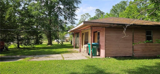 140 N 14th St, Ponchatoula, LA 70454 - view of home's exterior with a lawn
