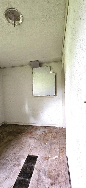 140 N 14th St, Ponchatoula, LA 70454 - spare room featuring a textured ceiling