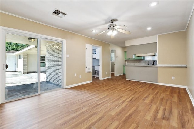 5927 Brighton Pl, New Orleans, LA 70131 - unfurnished living room with crown molding, a ceiling fan, baseboards, light wood-type flooring, and recessed lighting