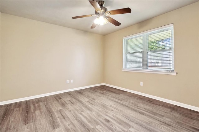 5927 Brighton Pl, New Orleans, LA 70131 - empty room with baseboards, wood finished floors, and ceiling fan