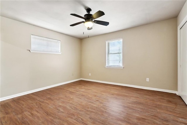 5927 Brighton Pl, New Orleans, LA 70131 - spare room featuring baseboards, wood finished floors, and ceiling fan