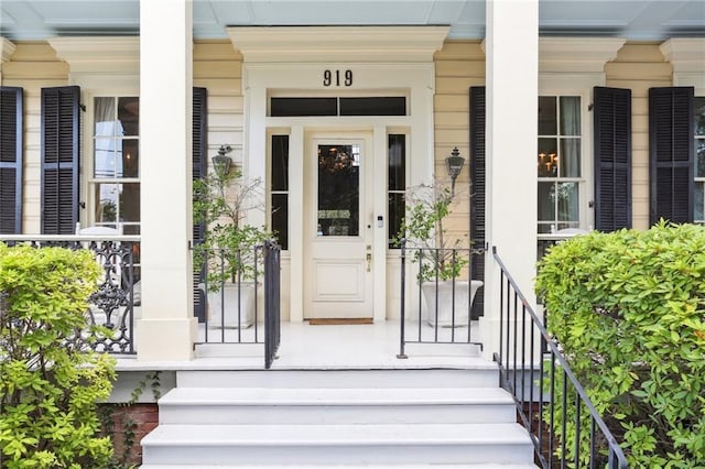 919 Robert St, New Orleans, LA 70115 - view of exterior entry with a porch