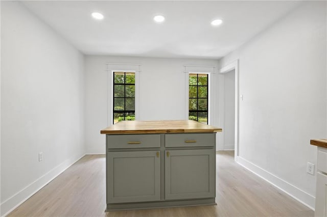 48 Bleu Lake Dr, Covington, LA 70435 - kitchen with wood counters, light wood-style floors, baseboards, recessed lighting, and gray cabinets