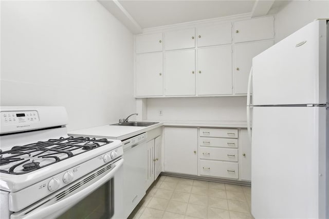 5402 St Charles Ave, New Orleans, LA 70115 - kitchen with white appliances, a sink, light countertops, and white cabinetry