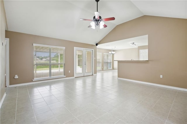 709 Bridle Ct, Covington, LA 70435 - unfurnished living room with vaulted ceiling, ceiling fan, a chandelier, baseboards, and light tile patterned floors