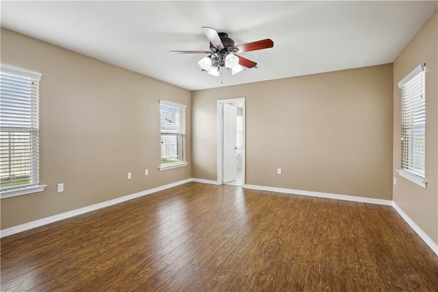 709 Bridle Ct, Covington, LA 70435 - spare room featuring a ceiling fan, wood finished floors, and baseboards