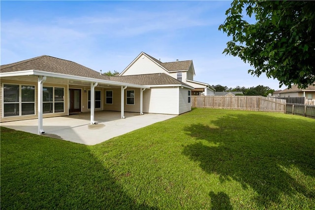 709 Bridle Ct, Covington, LA 70435 - rear view of house featuring a patio area and roof with shingles