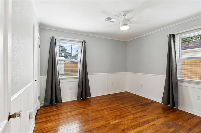 313 Harang Ave, Metairie, LA 70001 - spare room featuring hardwood / wood-style flooring, a ceiling fan, wainscoting, and ornamental molding