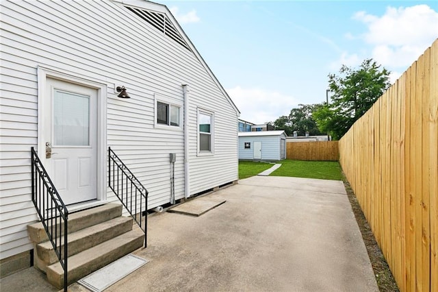 313 Harang Ave, Metairie, LA 70001 - fenced backyard featuring entry steps and a patio