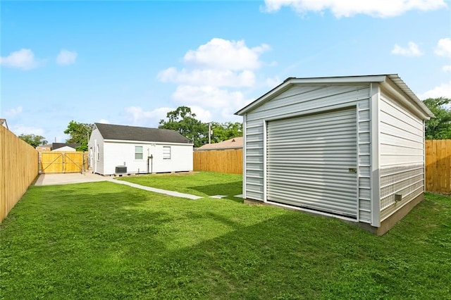 313 Harang Ave, Metairie, LA 70001 - view of yard featuring an outbuilding and a gate
