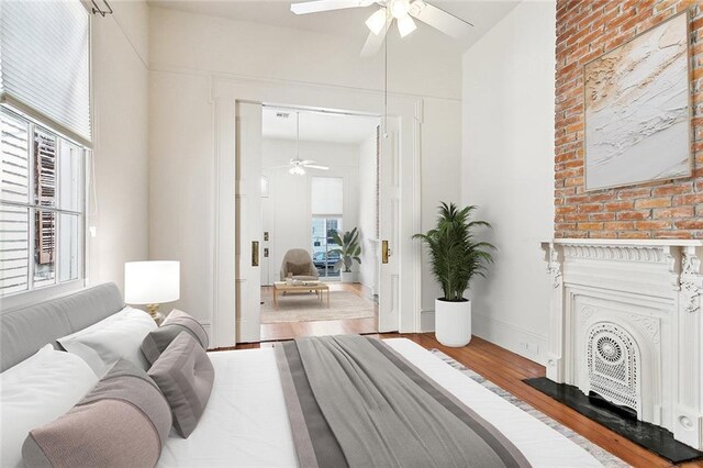 3119 Dauphine St, New Orleans, LA 70117 - bedroom with wood finished floors and a ceiling fan