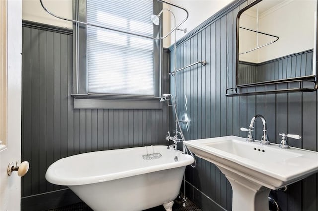 3119 Dauphine St, New Orleans, LA 70117 - bathroom featuring a freestanding tub and healthy amount of natural light