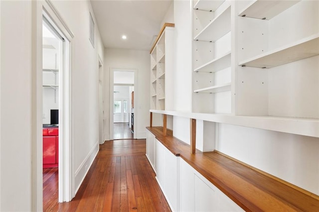 3119 Dauphine St, New Orleans, LA 70117 - corridor featuring dark wood-style flooring and recessed lighting