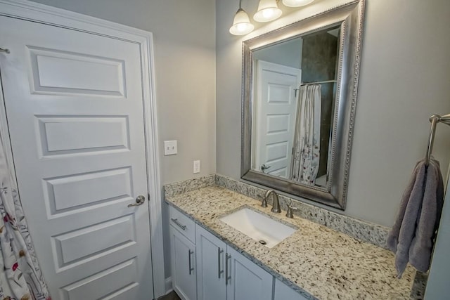 61113 Jade St, Lacombe, LA 70445 - bathroom featuring vanity and a shower with shower curtain