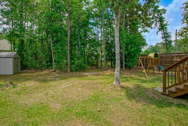 61113 Jade St, Lacombe, LA 70445 - view of green lawn with a playground