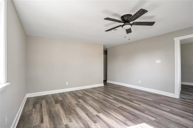 3417 W Louisiana State Dr, Kenner, LA 70065 - unfurnished room with wood finished floors, a ceiling fan, and baseboards