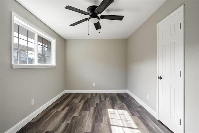 3417 W Louisiana State Dr, Kenner, LA 70065 - empty room featuring ceiling fan, dark wood-style floors, and baseboards