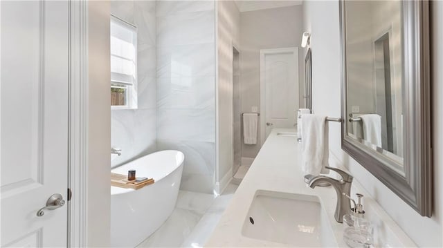 811 Rosa Ave, Metairie, LA 70005 - bathroom featuring a freestanding bath and double vanity