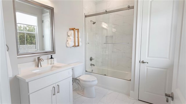 811 Rosa Ave, Metairie, LA 70005 - bathroom with marble finish flooring, toilet, vanity, and enclosed tub / shower combo