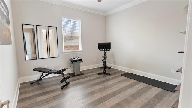 811 Rosa Ave, Metairie, LA 70005 - exercise area featuring wood finished floors, ornamental molding, and baseboards
