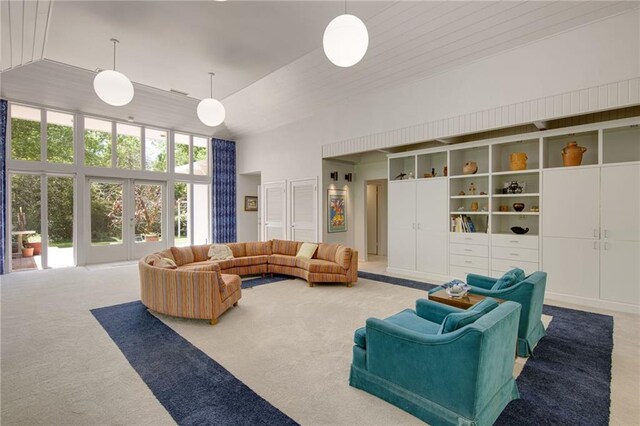 1450 Pine Tree Rd, Opelousas, LA 70570 - living room with carpet and a towering ceiling