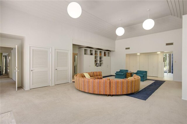 1450 Pine Tree Rd, Opelousas, LA 70570 - carpeted living area with a towering ceiling