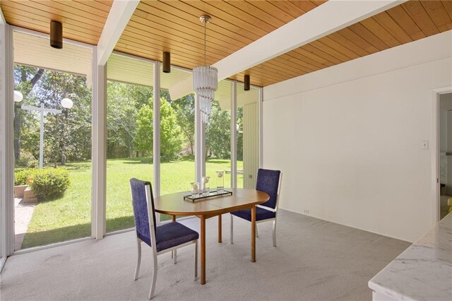 1450 Pine Tree Rd, Opelousas, LA 70570 - sunroom / solarium featuring carpet floors and wooden ceiling with exposed beams