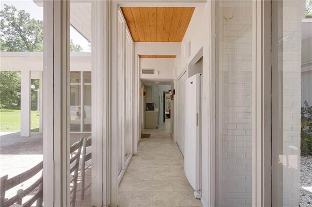 1450 Pine Tree Rd, Opelousas, LA 70570 - hall featuring healthy amount of natural light and wood ceiling