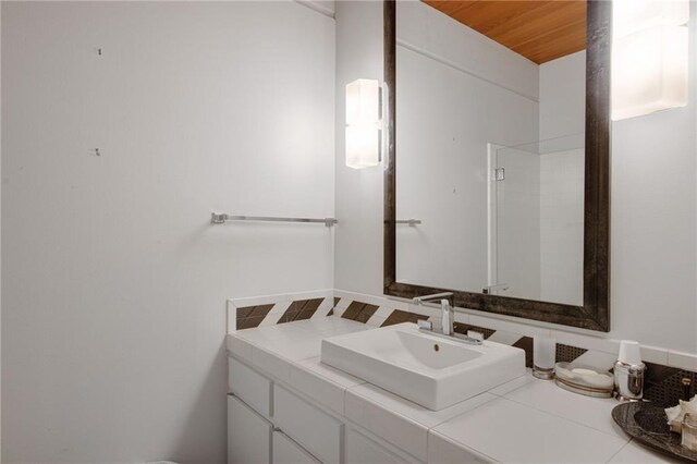 1450 Pine Tree Rd, Opelousas, LA 70570 - bathroom with vanity and a shower