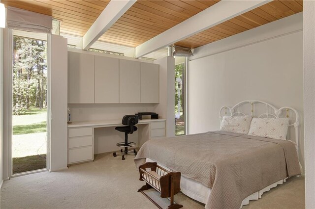 1450 Pine Tree Rd, Opelousas, LA 70570 - bedroom featuring multiple windows, light carpet, access to outside, and wooden ceiling with exposed beams