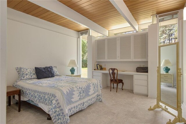 1450 Pine Tree Rd, Opelousas, LA 70570 - bedroom with wood ceiling with exposed beams