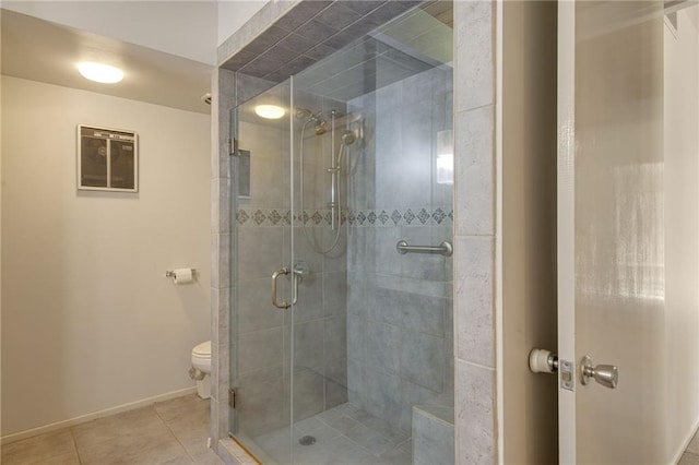 1450 Pine Tree Rd, Opelousas, LA 70570 - full bathroom with toilet, a shower stall, tile patterned flooring, and baseboards