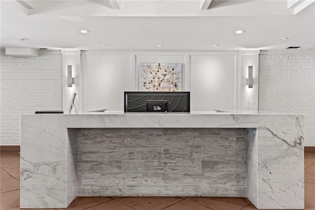 1765 Coliseum St Unit 303, New Orleans, LA 70130 - reception area with recessed lighting