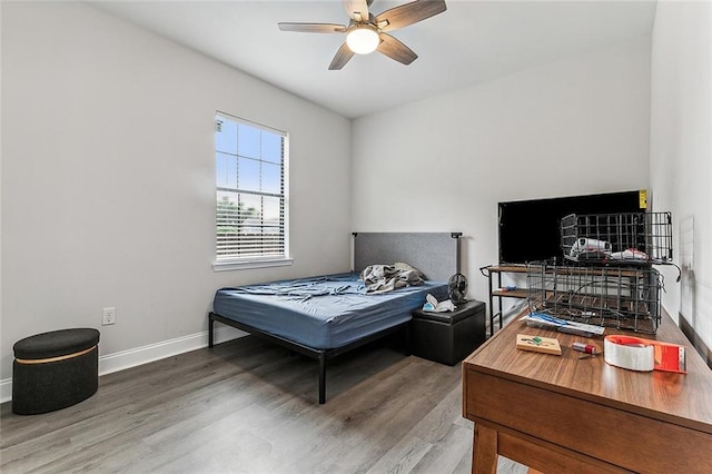 142325 Lamanche St, New Orleans, LA 70117 - bedroom featuring wood finished floors, baseboards, and a ceiling fan