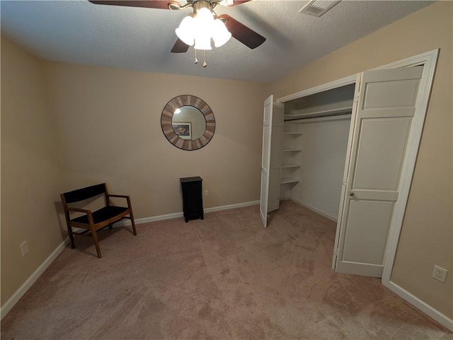 608 Eagle Dr, Slidell, LA 70461 - unfurnished bedroom featuring carpet flooring, ceiling fan, a textured ceiling, baseboards, and a closet