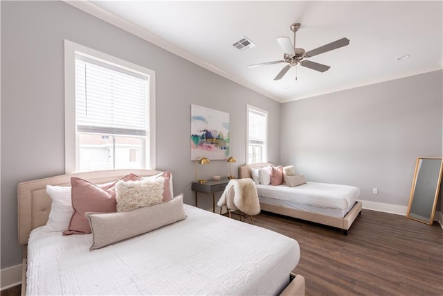 415 N Dupre St, New Orleans, LA 70119 - bedroom featuring wood finished floors, crown molding, baseboards, and a ceiling fan